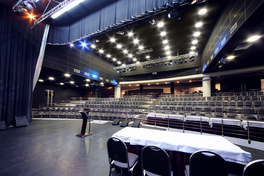 An empty event venue with the stage set by a professional AV provider
